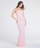 Turn heads at Prom 2025 in this pink prom dress, where statement-making details meet the iconic style of the Adrianna Strapless Mermaid Sequin Bead Formal Dress.