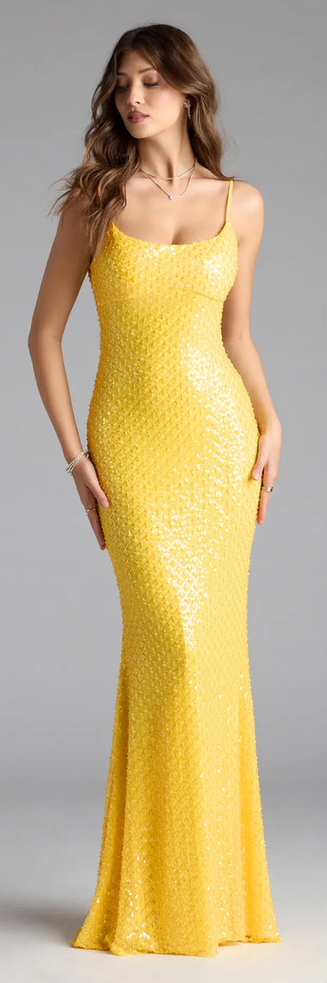 Own the spotlight in the Amal Open Back Mermaid Bead Sequin Formal Dress, a yellow formal dress crafted to deliver luxe style for summer weddings, Army Balls, or any special event.