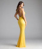 Turn heads at Prom 2025 in this yellow prom dress, where statement-making details meet the iconic style of the Amal Open Back Mermaid Bead Sequin Formal Dress.