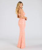 Flaunt your silhouette in the tight Darlene Cutout Back Bodycon Sequin Formal Dress in coral, a bodycon dress that empowers your look with bold style and effortless edge.