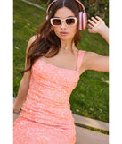 The Darlene Cutout Back Bodycon Sequin Formal Dress in luxe coral fabric, a stunning prom dress with statement details designed to make a bold impression at Prom 2025.