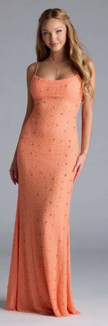 Own the spotlight in the Amara Corset Mermaid Sequin Formal Dress, a orange formal dress crafted to deliver luxe style for autumn weddings, Military Balls, or any special event.