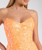 The Chandler Strapless Lace-Up Sequin Formal Dress in luxe neon fabric, a stunning prom dress with statement details designed to make a bold impression at Prom 2025.