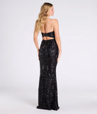 Turn heads at Prom 2025 in this black prom dress, where statement-making details meet the iconic style of the Barbara Strapless Slit Mermaid Sequin Formal Dress.