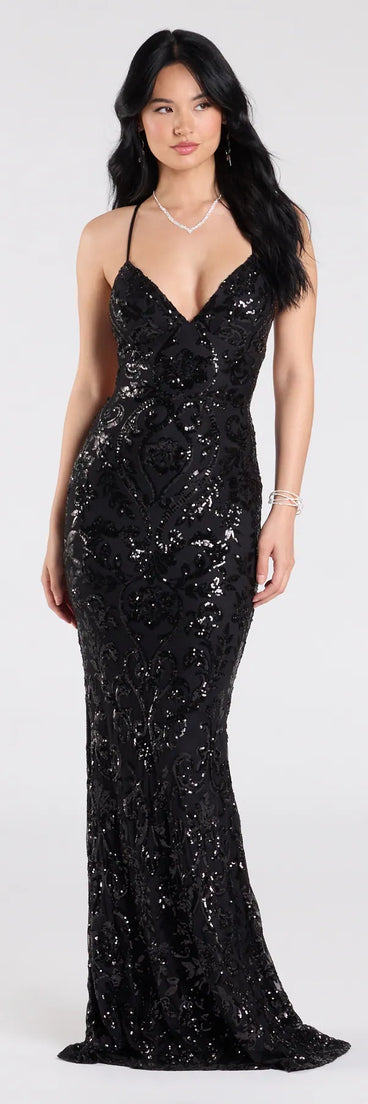 Own the spotlight in the Gisela Lace-Up Bodycon Sequin Formal Dress, a black formal dress crafted to deliver luxe style for summer weddings, Army Balls, or any special event.