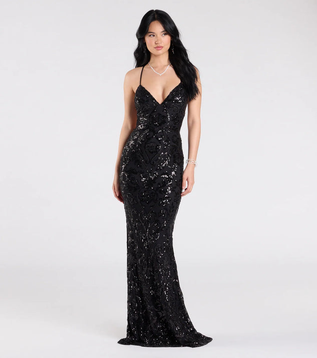 Own the spotlight in the Gisela Lace-Up Bodycon Sequin Formal Dress, a black formal dress crafted to deliver luxe style for summer weddings, Army Balls, or any special event.