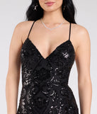 Own the spotlight in the Gisela Lace-Up Bodycon Sequin Formal Dress, a black formal dress crafted to deliver luxe style for summer weddings, Army Balls, or any special event.
