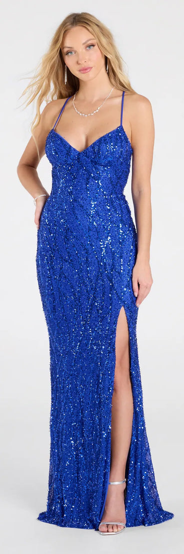 Own the spotlight in the Alexa Lace-Up Slit Sequin Formal Dress, a royal blue formal dress crafted to deliver luxe style for summer weddings, Army Balls, or any special event.