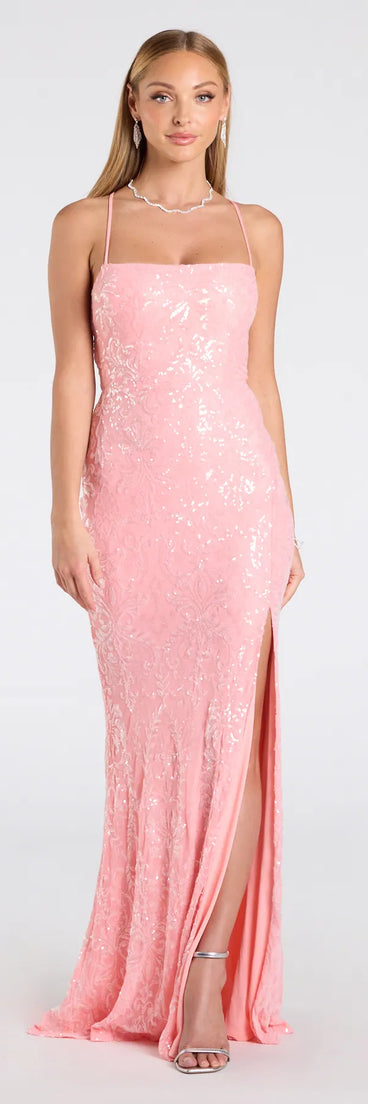 Own the spotlight in the Mariah Lace-Up Slit Sequin Formal Dress, a coral formal dress crafted to deliver luxe style for autumn weddings, Military Balls, or any special event.