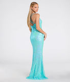 The Liana Formal Sequin Scroll Mermaid Dress in mint is a stunning green prom dress designed to capture attention with its fresh or bold color and effortlessly stylish silhouette.