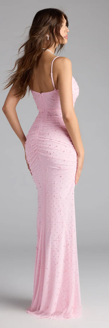 Own the spotlight in the Camilla Mermaid Rhinestone Pearl Formal Dress, a pink formal dress crafted to deliver luxe style for autumn weddings, Military Balls, or any special event.