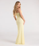 Turn heads at Prom 2025 in this yellow prom dress, where statement-making details meet the iconic style of the Marine Cutout Slit Mermaid Beaded Formal Dress.
