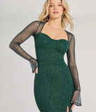 Make a bold statement in the Connie Glitter Long Sleeve Column Formal Dress in hunter green, the perfect green dress for weddings, cocktail hours, nights out, and/or seasonal celebrations.