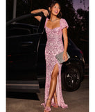 Make a bold statement in the Amber Puff Sleeve Lace-Up Slit Sequin Formal Dress in pink, the perfect spring dress for weddings, cocktail hours, nights out, and/or seasonal celebrations.