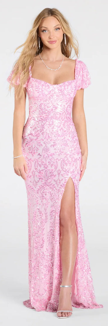 Own the spotlight in the Amber Puff Sleeve Lace-Up Slit Sequin Formal Dress, a pink formal dress crafted to deliver luxe style for autumn weddings, Military Balls, or any special event.