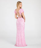 Turn heads at Prom 2025 in this pink prom dress, where statement-making details meet the iconic style of the Amber Puff Sleeve Lace-Up Slit Sequin Formal Dress.