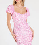 Turn heads at Prom 2025 in this pink prom dress, where statement-making details meet the iconic style of the Amber Puff Sleeve Lace-Up Slit Sequin Formal Dress.