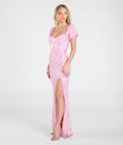 Turn heads at Prom 2025 in this pink prom dress, where statement-making details meet the iconic style of the Amber Puff Sleeve Lace-Up Slit Sequin Formal Dress.
