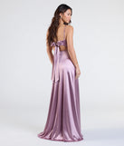 Make a bold statement in the Steffanie Tie Back Slit A-Line Satin Formal Dress in lavender, the perfect spring dress for weddings, cocktail hours, nights out, and/or seasonal celebrations.