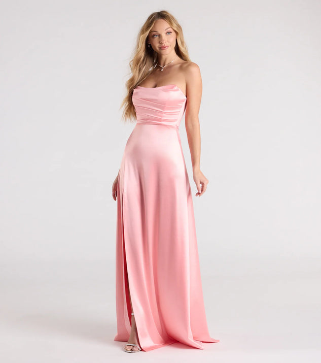 Turn heads at Prom 2025 in this coral prom dress, where statement-making details meet the iconic style of the Alison Strapless Slit A-Line Satin Formal Dress.