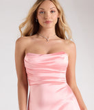 Turn heads at Prom 2025 in this coral prom dress, where statement-making details meet the iconic style of the Alison Strapless Slit A-Line Satin Formal Dress.