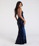 Step into the Prom 2025 dance in the Gisele Sequin Velvet Lace-Up Mermaid Dress in navy, a stunning blue prom dress designed to complement any theme with its timeless allure and statement-making style.