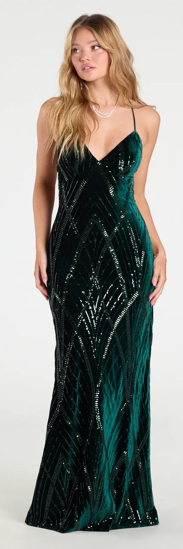 Own the spotlight in the Gisele Sequin Velvet Lace-Up Mermaid Dress, a hunter green formal dress crafted to deliver luxe style for autumn weddings, Military Balls, or any special event.