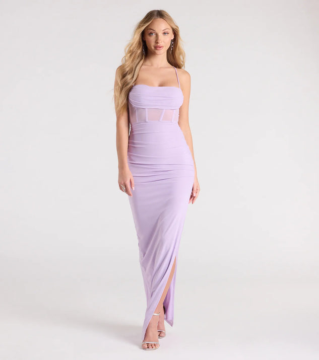 Turn heads at Prom 2025 in this lavender prom dress, where statement-making details meet the iconic style of the Rose Formal Mesh Corset Column Dress.
