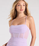 Turn heads at Prom 2025 in this lavender prom dress, where statement-making details meet the iconic style of the Rose Formal Mesh Corset Column Dress.