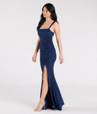 Step into the Prom 2025 dance in the Drew Open Back Glitter Mermaid Dress in navy, a stunning blue prom dress designed to complement any theme with its timeless allure and statement-making style.