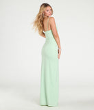 The Shelly High Slit Glitter Knit Formal Dress in sage is a stunning green prom dress designed to capture attention with its fresh or bold color and effortlessly stylish silhouette.