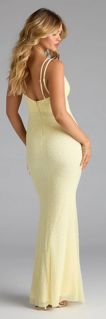 Own the spotlight in the Capriana V-Neck Mermaid Bead Sequin Formal Dress, a yellow formal dress crafted to deliver luxe style for fall weddings, military balls, or any special event.