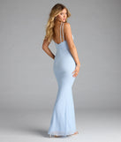 Step into summer looking effortlessly chic in the Capriana V-Neck Mermaid Bead Sequin Formal Dress in light blue, a must-have Windsor dress for your warm-weather wardrobe.