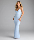 Step into summer looking effortlessly chic in the Capriana V-Neck Mermaid Bead Sequin Formal Dress in light blue, a must-have Windsor dress for your warm-weather wardrobe.