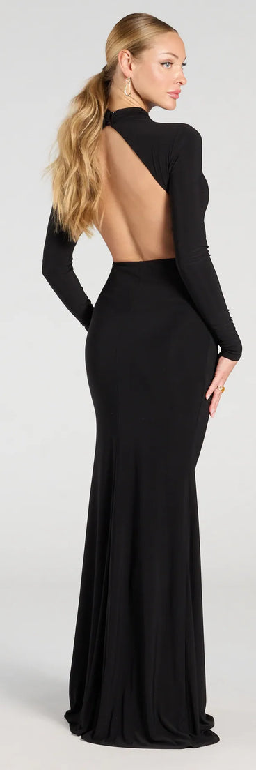 The Vienna Long Sleeve Open Back Bodycon Formal Dress is a show-stopping black prom dress, offering a sleek, slimming silhouette that enhances your natural beauty for an unforgettable night.
