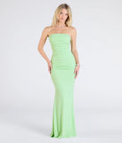 The Mischka Strapless Mermaid Glitter Formal Dress in lime is a stunning green prom dress designed to capture attention with its fresh or bold color and effortlessly stylish silhouette.