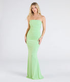 The Mischka Strapless Mermaid Glitter Formal Dress in lime is a stunning green prom dress designed to capture attention with its fresh or bold color and effortlessly stylish silhouette.