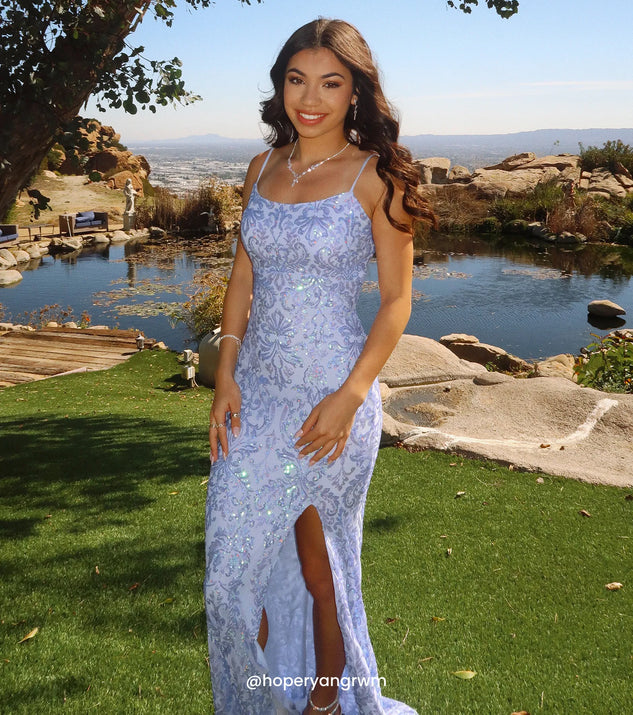 Turn heads at Prom 2025 in this periwinkle prom dress, where statement-making details meet the iconic style of the Paulina Strappy Open Back Slit Sequin Formal Dress.