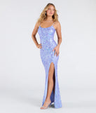 Step into the Prom 2025 dance in the Paulina Strappy Open Back Slit Sequin Formal Dress in periwinkle, a stunning blue prom dress designed to complement any theme with its timeless allure and statement-making style.
