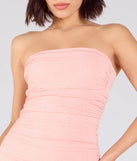 Make a bold statement in the Mischka Strapless Mermaid Glitter Formal Dress in coral, the perfect spring dress for weddings, cocktail hours, nights out, and/or seasonal celebrations.