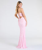 Make a bold statement in the Tarna Lace-Up Bead Sequin Mermaid Formal Dress in pink, the perfect spring dress for weddings, cocktail hours, nights out, and/or seasonal celebrations.