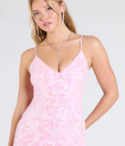 Make a bold statement in the Tarna Lace-Up Bead Sequin Mermaid Formal Dress in pink, the perfect spring dress for weddings, cocktail hours, nights out, and/or seasonal celebrations.