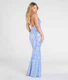 Make a bold statement in the Blaire Halter Open Back Mermaid Sequin Formal Dress in periwinkle, the perfect spring dress for weddings, cocktail hours, nights out, and/or seasonal celebrations.