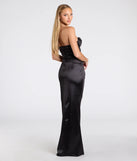 The Noel Strapless Sweetheart Slit Satin Formal Dress is a show-stopping black prom dress, offering a sleek, slimming silhouette that enhances your natural beauty for an unforgettable night.