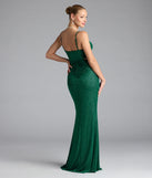 Turn heads at Prom 2025 in this hunter green prom dress, where statement-making details meet the iconic style of the Elliana Cutout Slit Glitter Formal Dress.