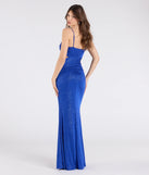Step into the Prom 2025 dance in the Elliana Cutout Slit Glitter Formal Dress in royal, a stunning blue prom dress designed to complement any theme with its timeless allure and statement-making style.