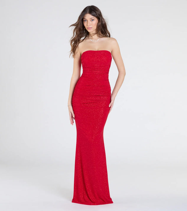 Make a statement in the Mischka Strapless Mermaid Glitter Formal Dress, a bold red prom dress designed to exude confidence, elegance, and a striking prom-night look.