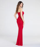 Make a statement in the Mischka Strapless Mermaid Glitter Formal Dress, a bold red prom dress designed to exude confidence, elegance, and a striking prom-night look.