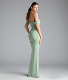 Turn heads at Prom 2025 in this sage green prom dress, where statement-making details meet the iconic style of the Ramona Off-The-Shoulder Mermaid Formal Dress.