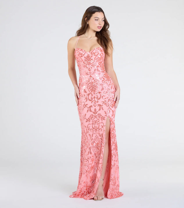 Make a bold statement in the Shelby Lace-Up Slit Sequin Formal Dress in coral, the perfect spring dress for weddings, cocktail hours, nights out, and/or seasonal celebrations.